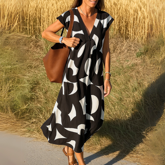 Tirzah | Fluid Geometric Dress with V-Neck