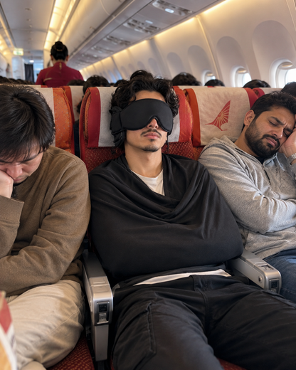 Traveler resting in an airplane seat